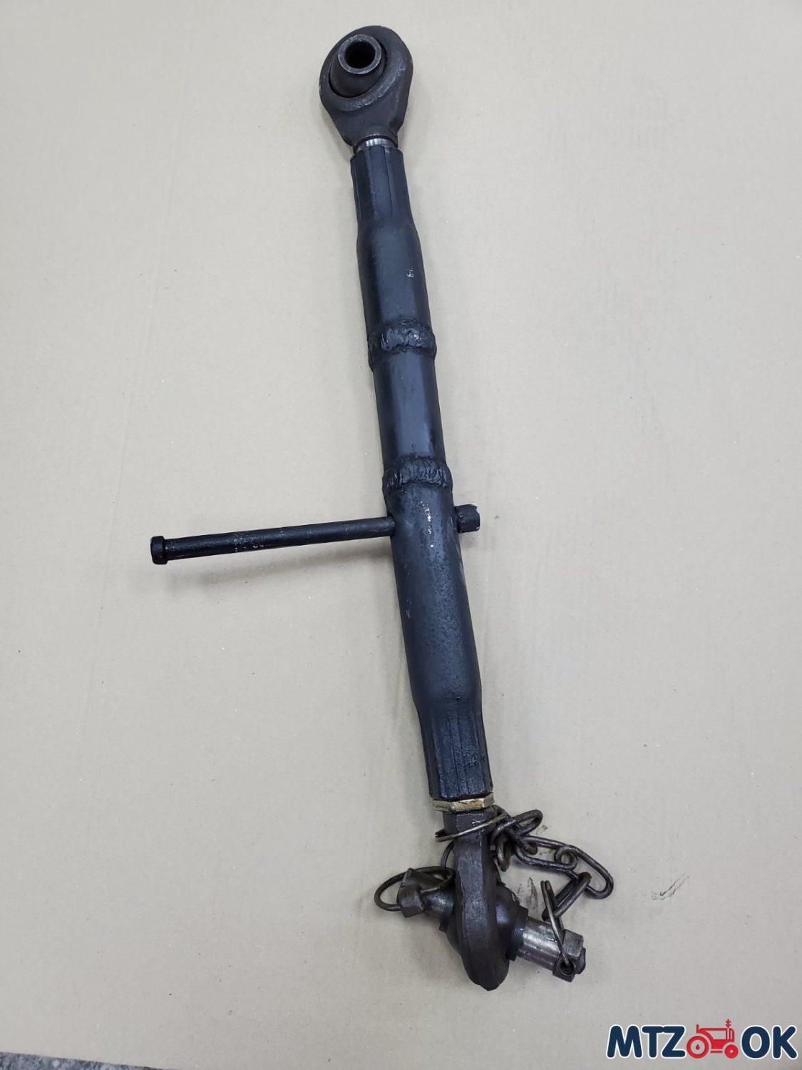 tjaga-centralnaja-mtz-verhnjaja-meh.-zadnej-naveski-udlinennaja-mezhdu-jablokami-61sm-10sm